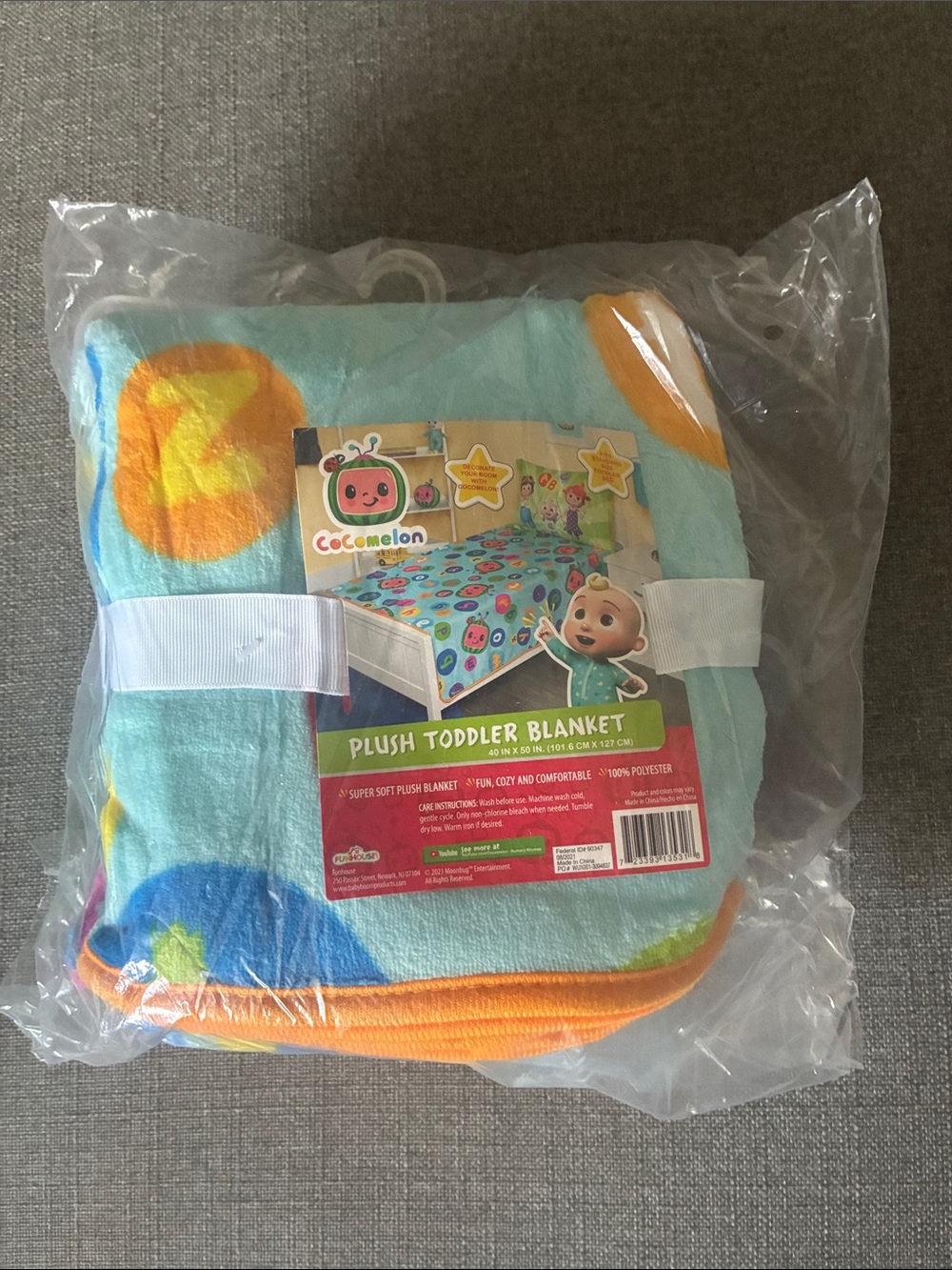 CoComelon Plush Toddler Blanket - Light Blue with Orange Trim